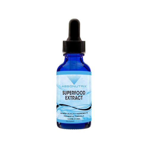 Blue bottle of superfood extract with a dropper on a white background